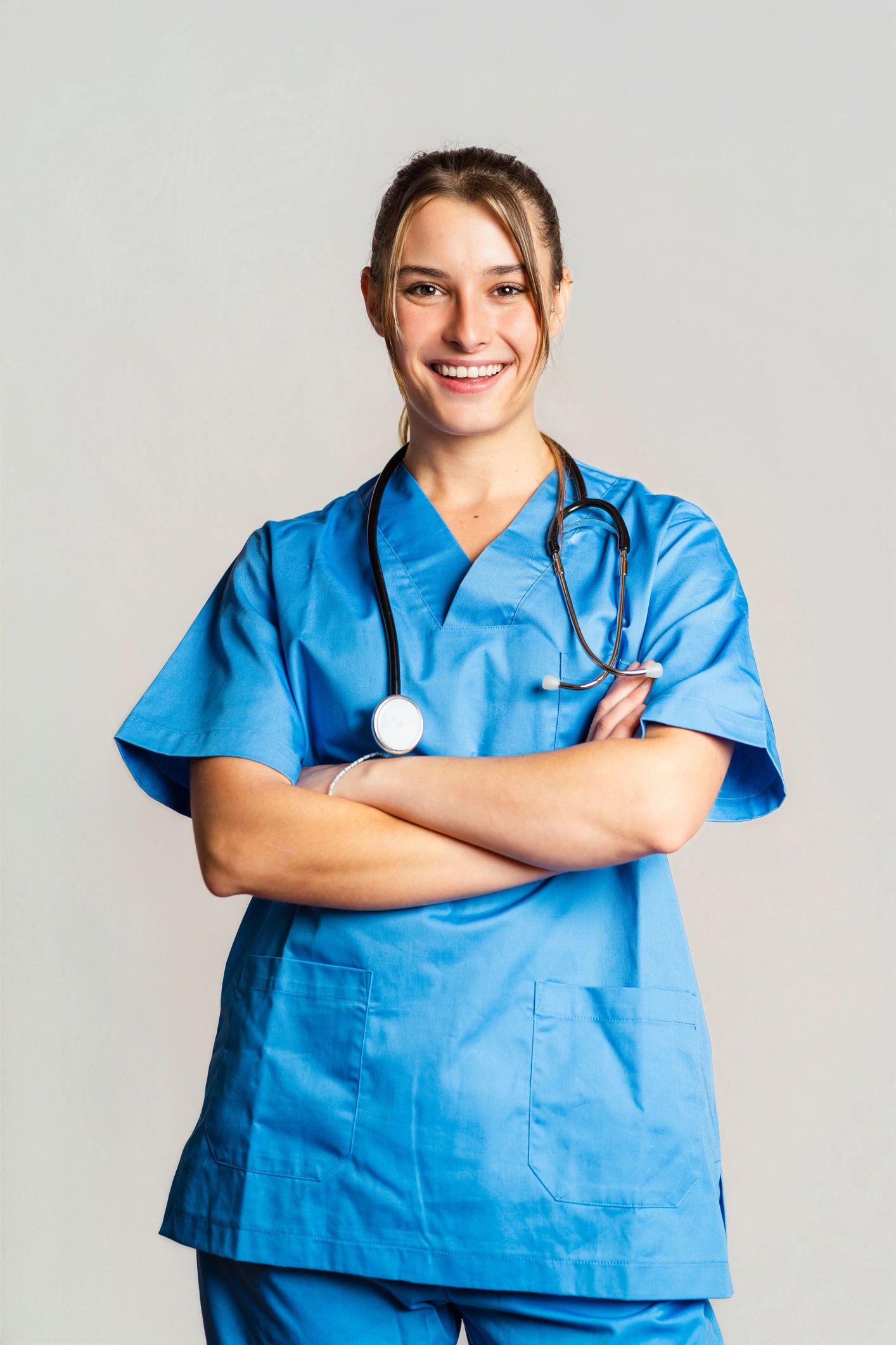 Healthcare professional in scrubs with stethoscope