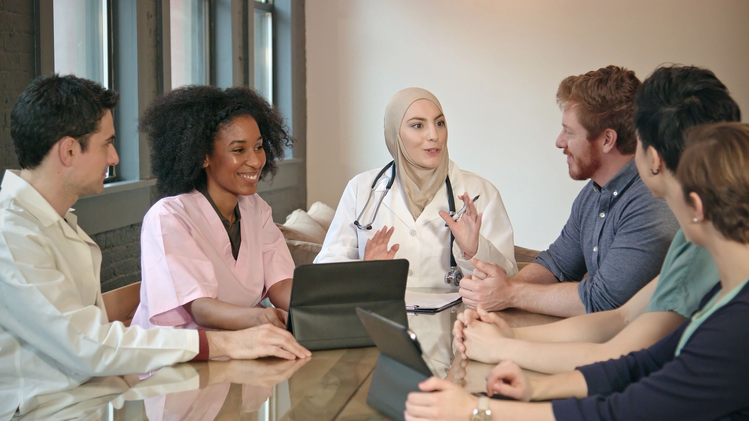 Healthcare team meeting in a clinical setting